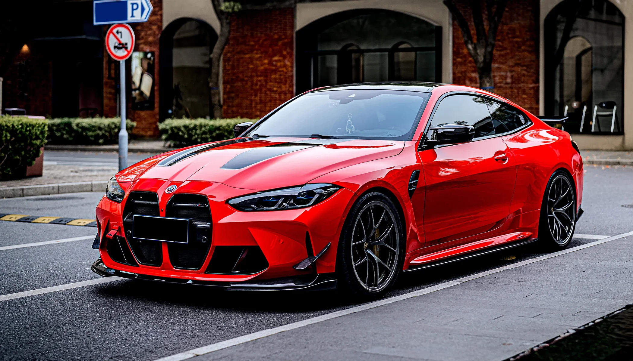 Red BMW M4 vinyl wrap by Tint Station in Deerfield Beach, FL